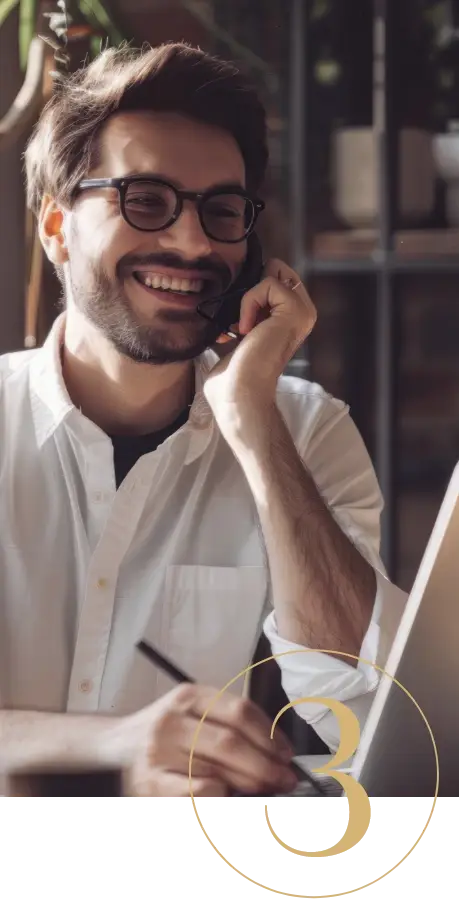 A man is speaking on the phone.